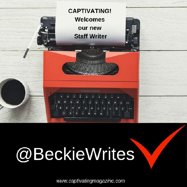 A red type writer has a piece of paper in it that reads, "CAPTIVATING! Welcomes our New Staff Writer"